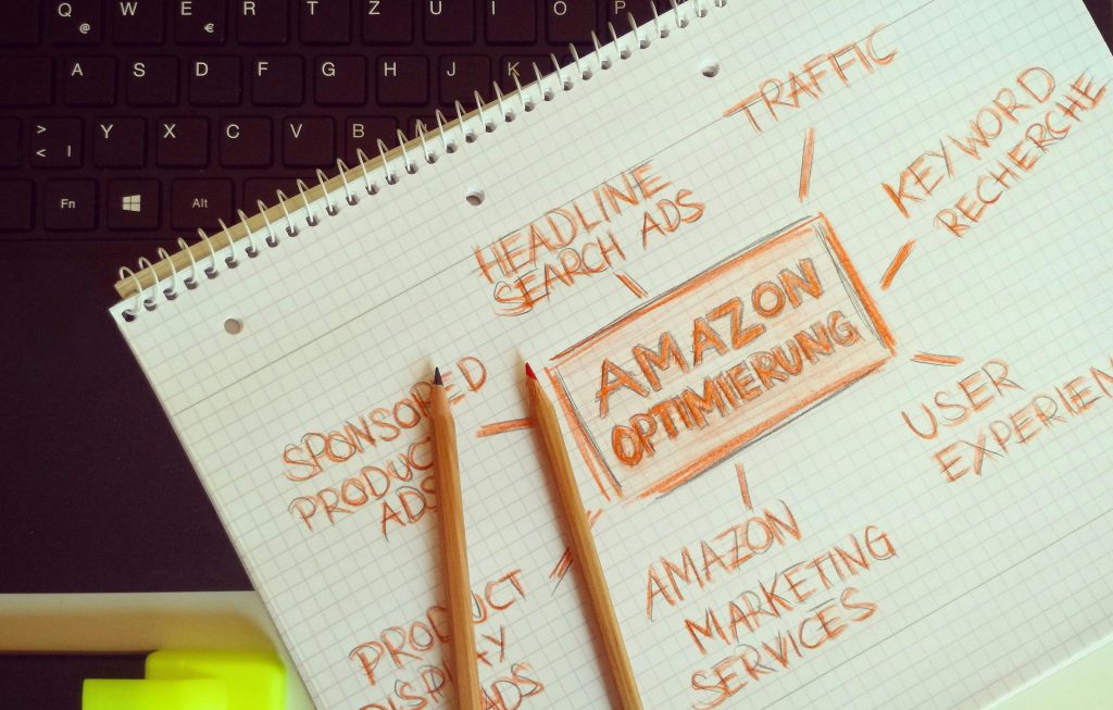 3 Mistakes CPG Brands Make When Launching Online (and How to Fix Them Fast) Visual representation of Amazon optimization techniques with handwritten notes and pencils.